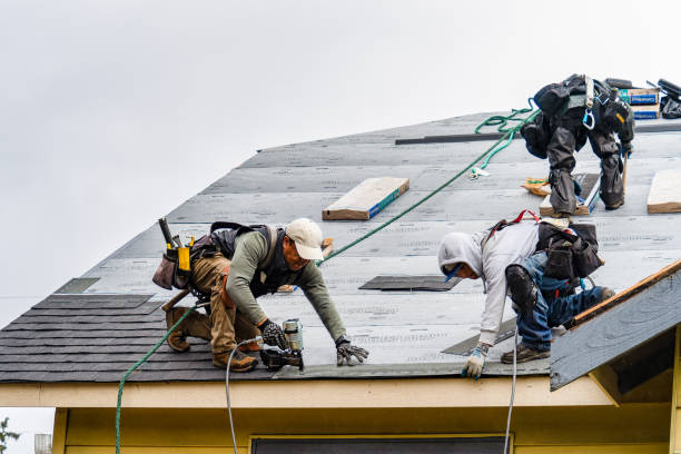 Professional Gutter Installation technician working in Avon, MA